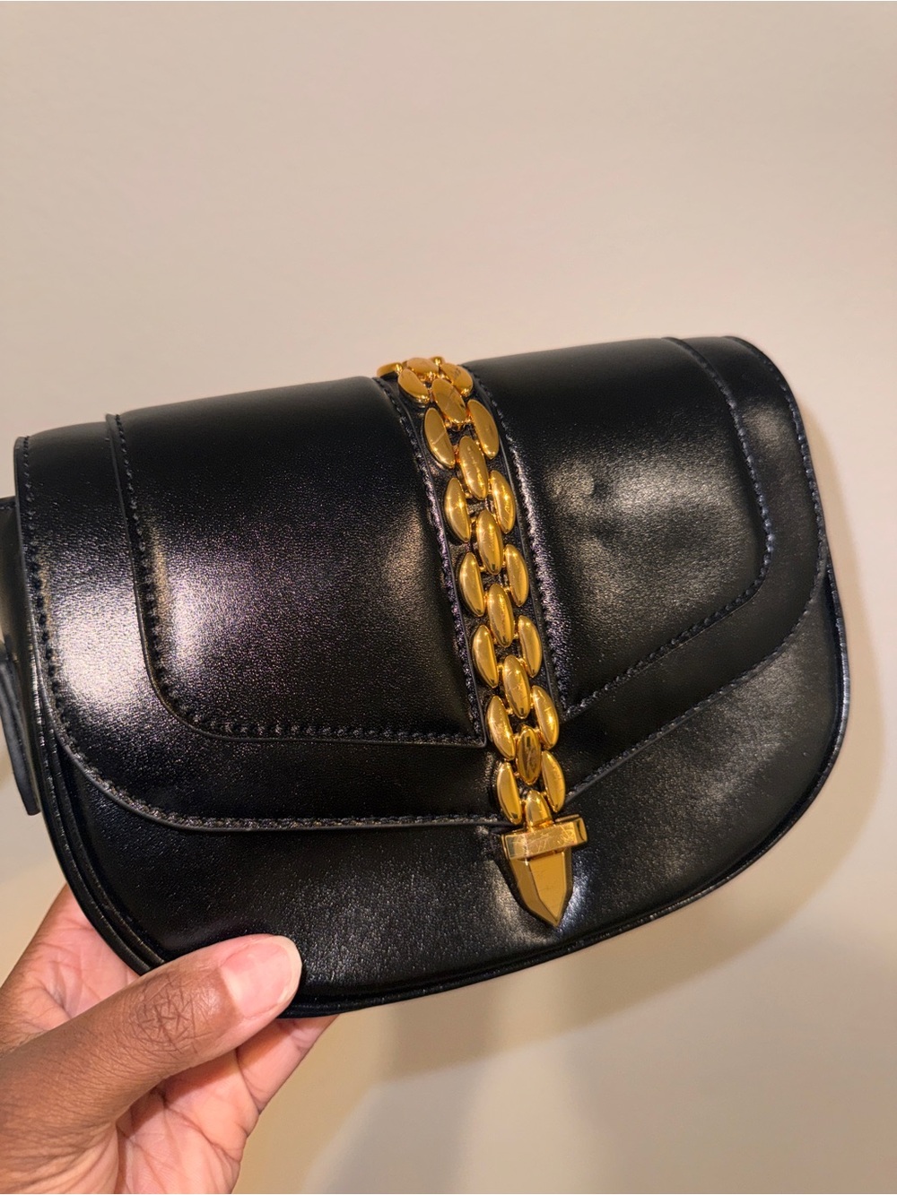 Black Leather Shoulder Bag with Gold Chain Accent